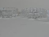 five glasses sitting on a table with a white background