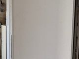 an image of a refrigerator in a kitchen with the door open