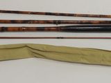 three different types of fishing rods and a bag