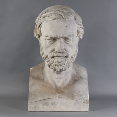 marble bust of a man with a beard and a mustache