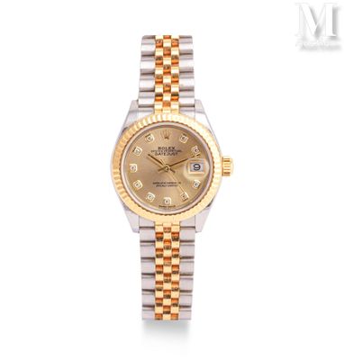 an image of a lady ' s rolex watch with two tone gold and diamonds