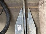 a picture of a pair of tools that are sitting on the floor
