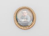 an old picture of a young boy with pearls in a gold frame