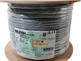 a roll of white electrical wire on a wooden stand