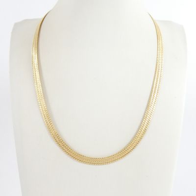 a gold chain necklace on a mannequin mannequin mannequin mannequin mannequin mannequin mannequin mannequin manne