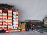 a lot of toy trains that are sitting on a table