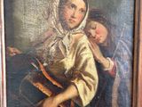une peinture ancienne représentant une femme tenant un enfant dans ses bras