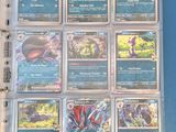 a close up of a binder with a bunch of cards on it