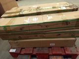 many boxes stacked on a pallet in a warehouse