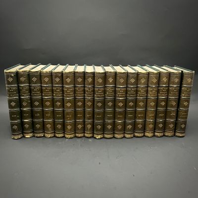 a set of twelve antique leather bound books with gold bindings