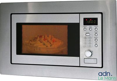 a microwave with a basket of food inside of it