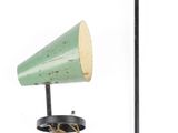 two lamps that are sitting on a stand
