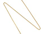 un collier en or auquel est attachée une chaîne