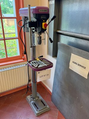 a machine that is sitting in front of a window