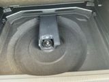 an image of the inside of a car with the door open