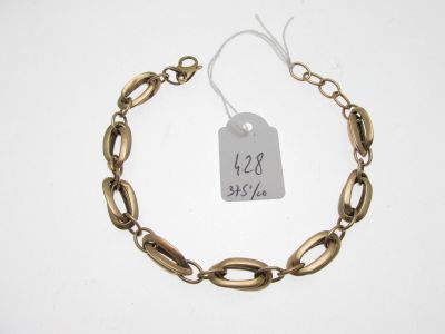a close up of a bracelet with a price tag on it