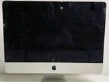 a white apple desktop computer sitting on a white table