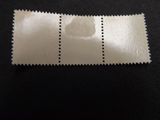 a close up of a piece of paper on a black surface