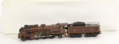 a toy train that is sitting on a white surface