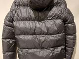 an image of a jacket hanging up on a wall