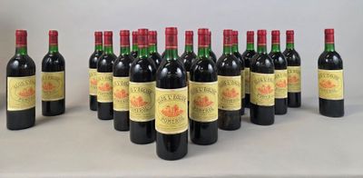 plusieurs bouteilles de vin posées sur une table