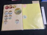 a book with stickers on it sitting on a table