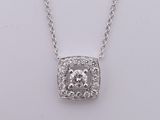 an image of a diamond necklace on a chain on a white surface