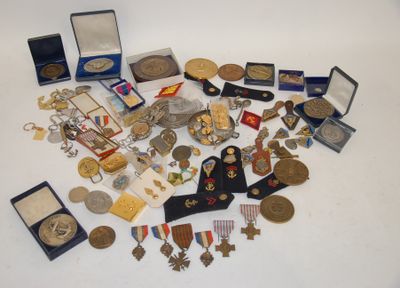many medals and medals that are on the table