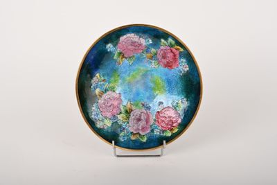 a picture of a plate with flowers painted on it