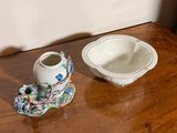 a small bowl and a small bowl on a wooden table