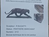 poster on the wall of a building with a picture of a cat
