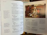an open book with a picture of a woman in a kitchen