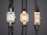 three different types of watches are displayed on a black background