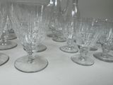 a lot of empty wine glasses sitting on a table