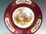 a plate with a picture of two children on it