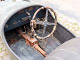 an old car with a steering and a steering wheel