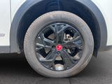 a close up view of a tire on a car