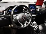 the interior of a car with a steering wheel, dashboard, and display screen