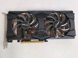 a close up of a video card with a fan on top of it