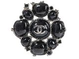 chanel brooch with black onyx stones and diamonds