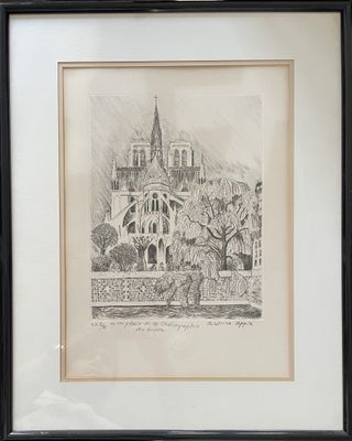 dessin d'une église dans un cadre noir sur un mur blanc
