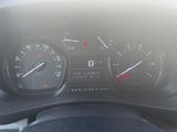 a close up of a car dashboard with a speedometer and gauges
