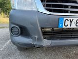 a car that has a number plate on the front of it