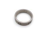 an image of a close up of a ring on a white surface