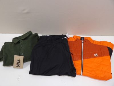 three pieces of clothing sitting on top of a table next to each other