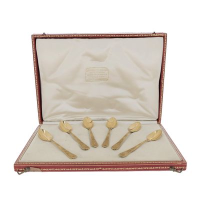 five spoons and a fork in a case