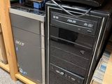 a computer on a desk with a lot of boxes