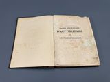 an open book on a table with a blue background