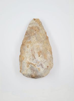 a close up of a rock on a white surface