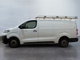 a white van that is parked in a parking lot